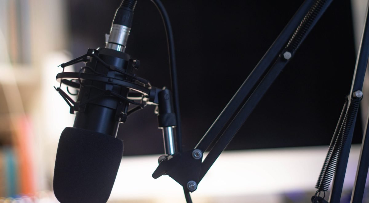 Featured Image: AI voice cloning technology creating a digital version of a person's voice.